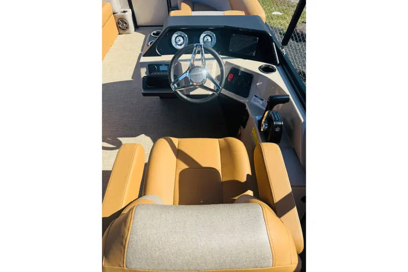 Slide: The Image of Captain's seat and helm of 2026 Crest Conquest SE 180 Cruise boat. - 8