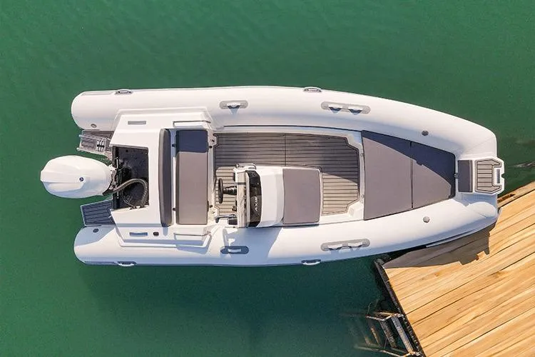 Slide: The Image of Overhead view of 2026 Northstar Axis 5.3 boat docked on calm water. - 3