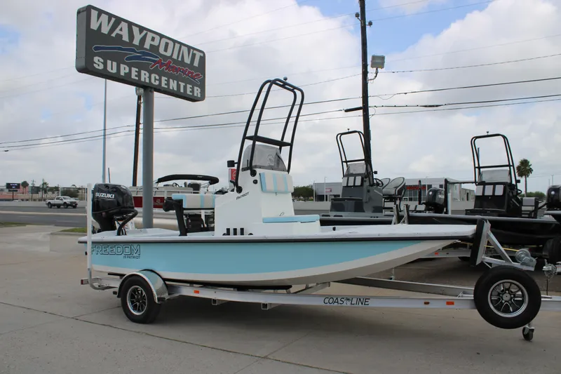 The Image of 2026 Freedom Boats 19 PATRIOT at Waypoint Marine Supercenter, displayed on a trailer. - 0
