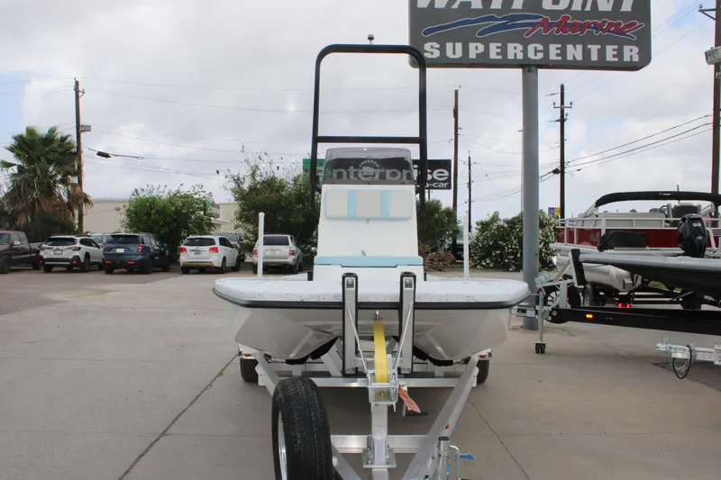 Slide: The Image of 2026 Freedom Boats 19 PATRIOT on trailer at dealership, showcasing marine supercenter. - 17