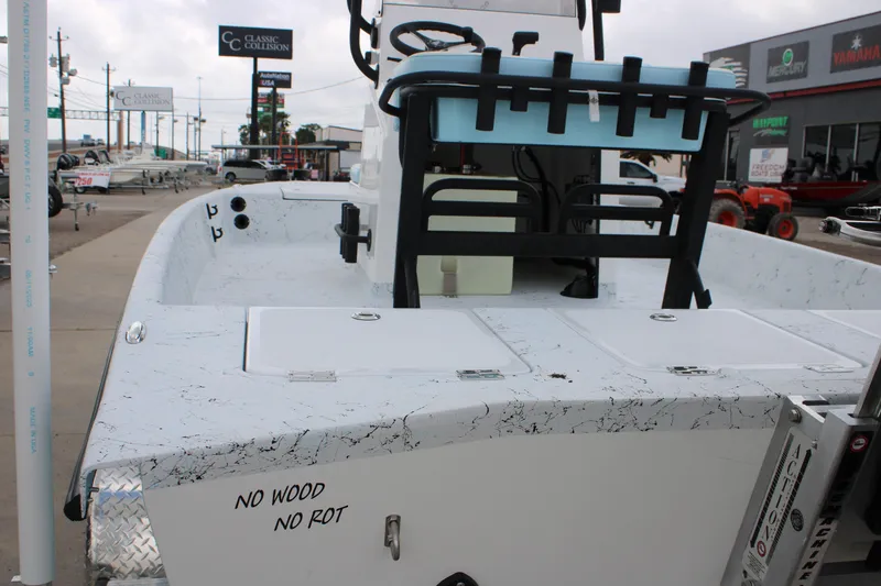 Slide: The Image of 2026 Freedom Boats 19 PATRIOT with "No Wood No Rot" design, displayed at dealership. - 18