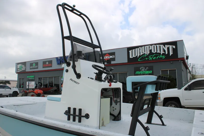 Slide: The Image of 2026 Freedom Boats 19 PATRIOT at Waypoint Customs dealership, showcasing sleek design. - 6