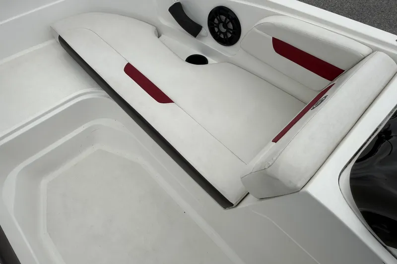 Slide: The Image of 2023 Hurricane SunDeck Sport 185 OB boat interior with white and red seating. - 14