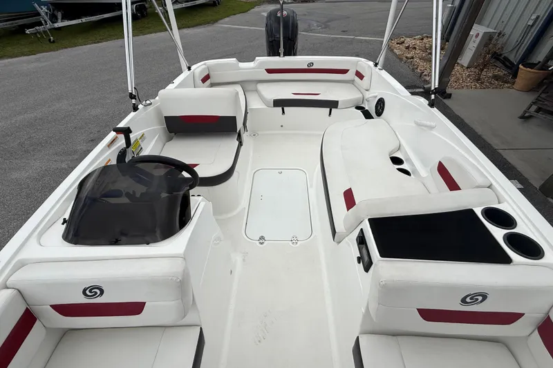 Slide: The Image of 2023 Hurricane SunDeck Sport 185 OB boat interior with white and red seating. - 15