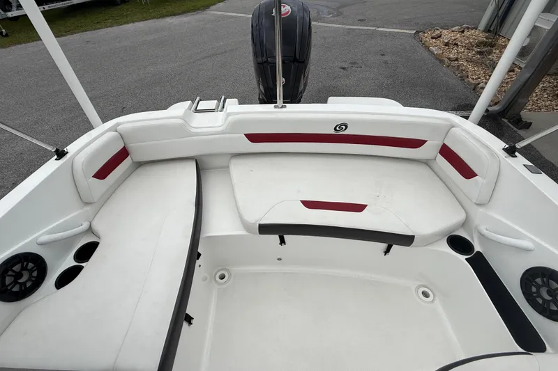 Slide: The Image of 2023 Hurricane SunDeck Sport 185 OB boat interior with white and red seating. - 18