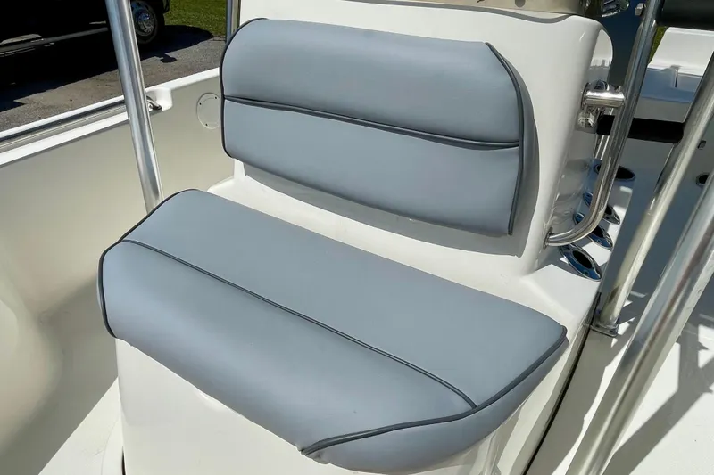 Slide: The Image of 2016 Bulls Bay 2000 boat seat with gray upholstery and stainless steel frame. - 10