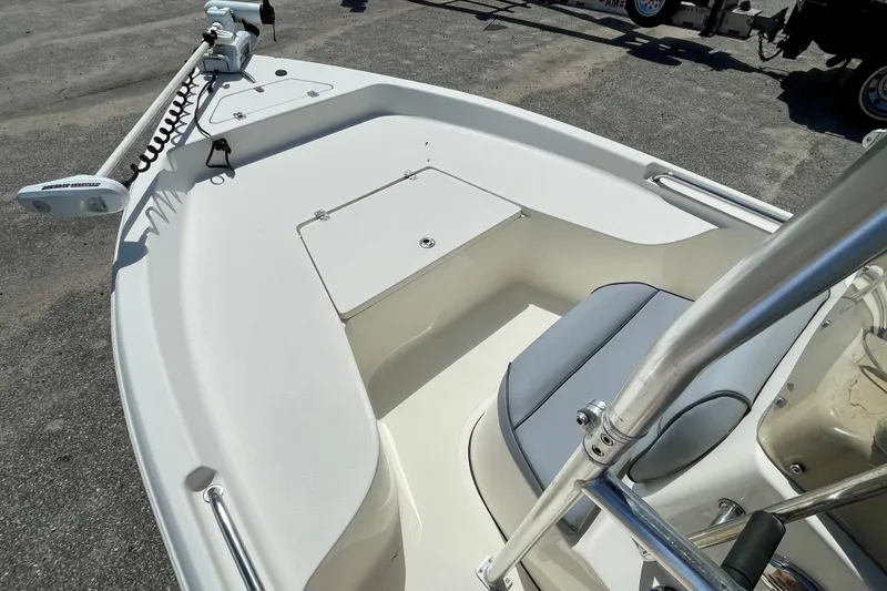 Slide: The Image of 2016 Bulls Bay 2000 boat interior with seating and storage compartments. - 11