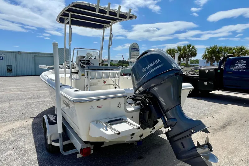 Slide: The Image of 2016 Bulls Bay 2000 boat with Yamaha outboard motor, parked outdoors. - 7