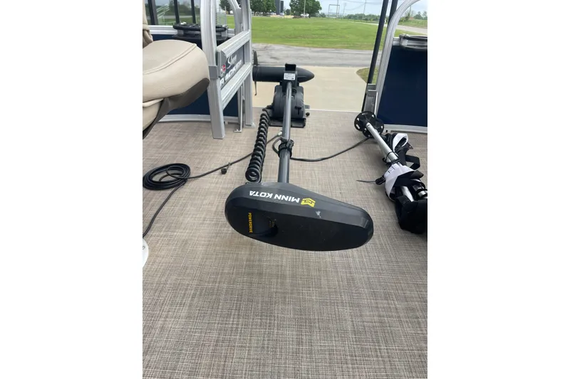 Slide: The Image of 2023 Sun Tracker Bass Buggy 16 XL Select with Minn Kota trolling motor on deck. - 5