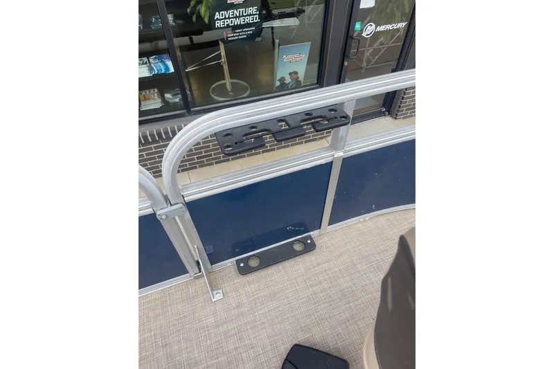 Slide: The Image of 2023 Sun Tracker Bass Buggy 16 XL Select pontoon boat railing and deck detail. - 6