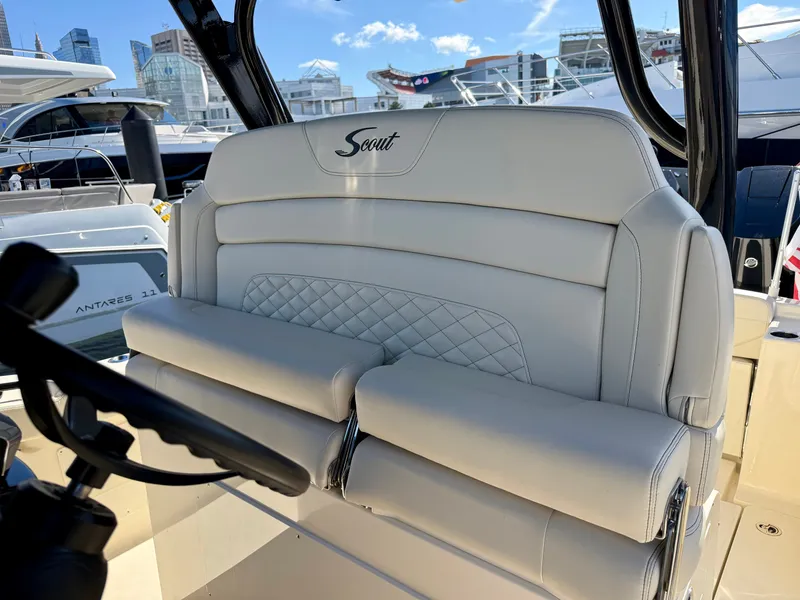Slide: The Image of The 2027 Scout 330 LXF features luxurious, cushioned seating with quilted pattern and modern design. - 10