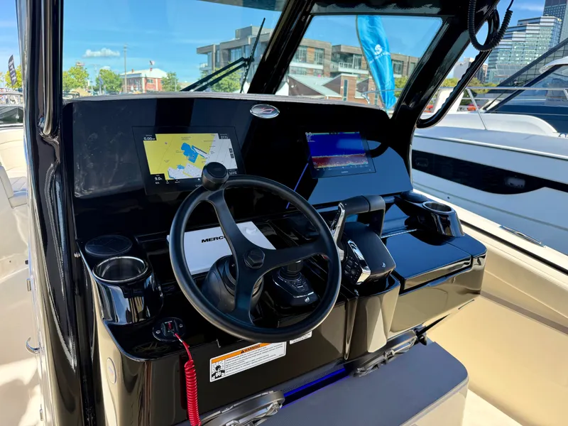 Slide: The Image of The 2027 Scout 330 LXF cockpit features modern navigation systems and a sleek design. - 8