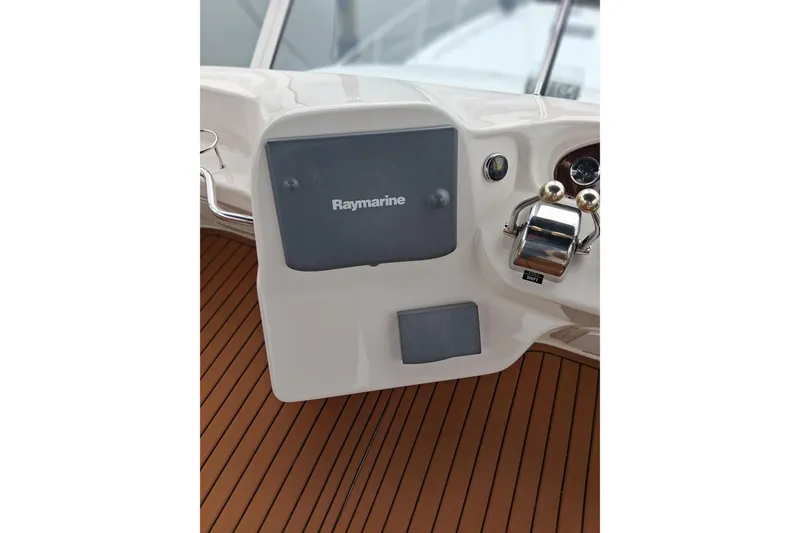 Slide: The Image of Control panel of 2003 Sea Ray 400 Sedan Bridge with Raymarine equipment. - 15