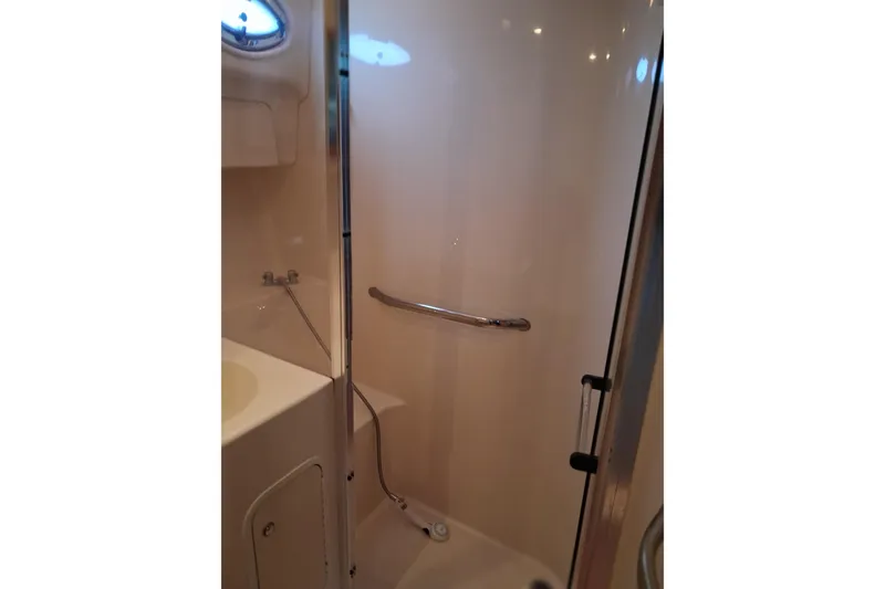 Slide: The Image of Shower area in 2003 Sea Ray 400 Sedan Bridge yacht bathroom. - 37