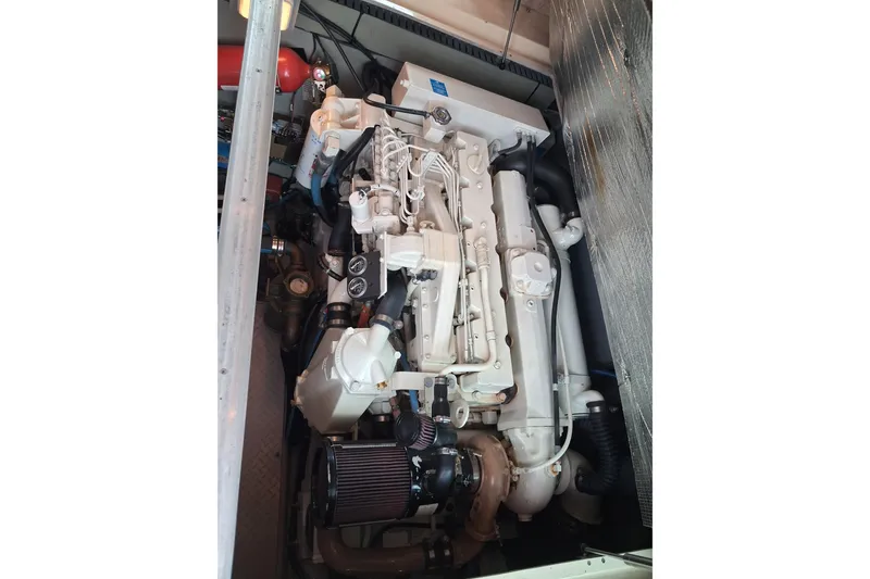 Slide: The Image of Engine compartment of a 2003 Sea Ray 400 Sedan Bridge yacht. - 49