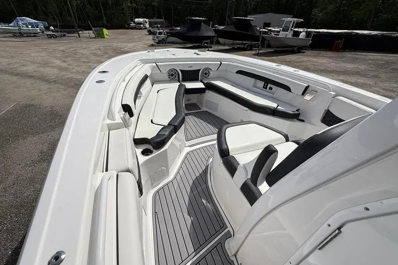 Slide: The Image of 2022 Tidewater 272 LXF boat interior with sleek seating and modern design. - 27