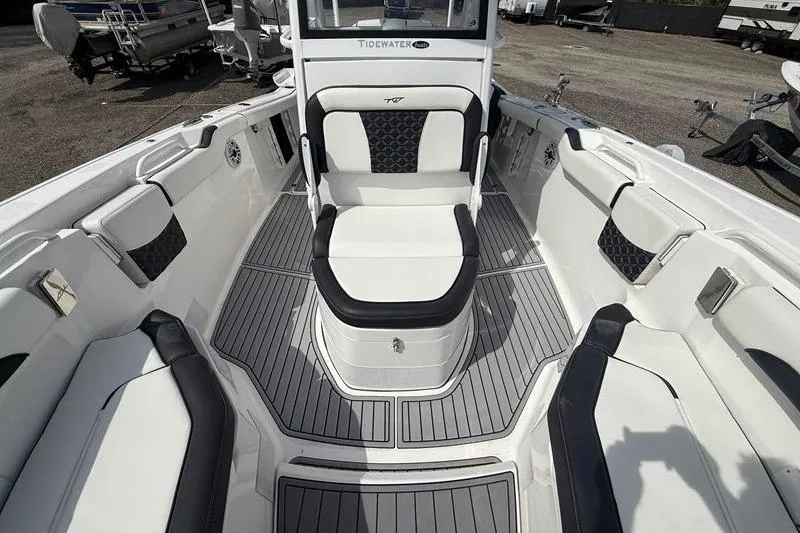 Slide: The Image of 2022 Tidewater 272 LXF boat interior with sleek seating and modern design. - 29