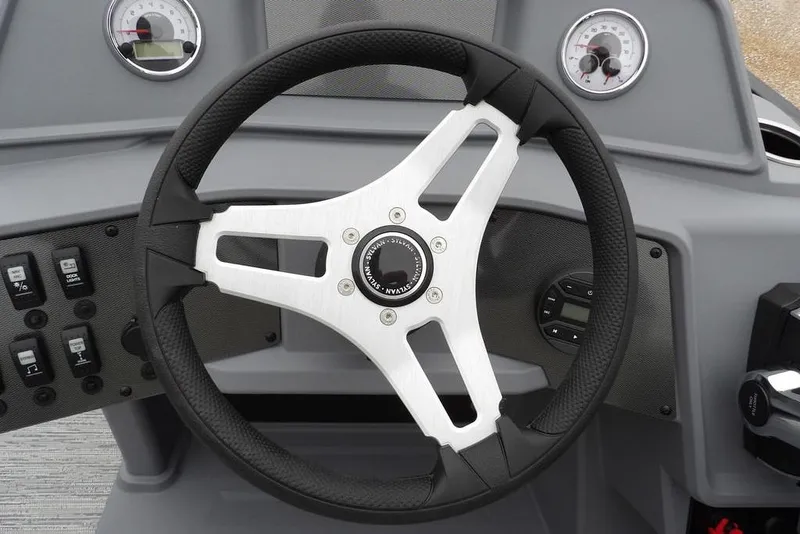 Slide: The Image of Steering wheel of 2026 Sylvan R-20 CLZ DH boat with dashboard controls. - 10