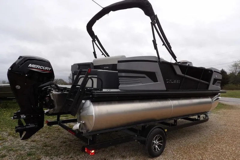 Slide: The Image of 2026 Sylvan R-20 CLZ DH pontoon boat with Mercury outboard engine on trailer. - 19