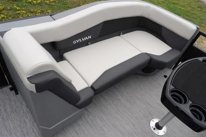 Slide: The Image of 2026 Sylvan R-20 CLZ DH boat interior with plush seating and cup holders. - 23