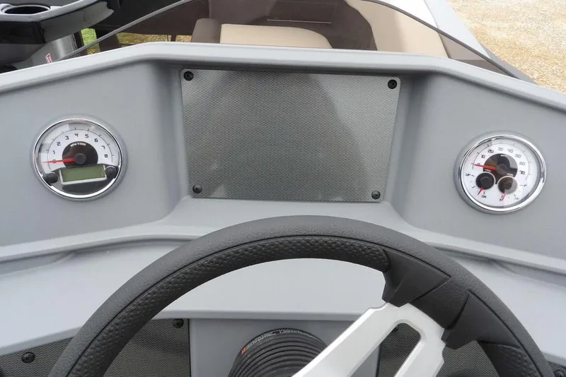 Slide: The Image of Dashboard of 2026 Sylvan R-20 CLZ DH boat with steering wheel and gauges. - 27