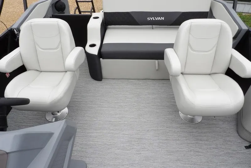 Slide: The Image of Interior of 2026 Sylvan R-20 CLZ DH boat with white seating and modern design. - 29