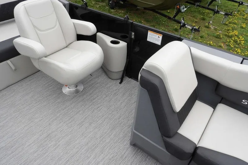 Slide: The Image of Luxurious seating on 2026 Sylvan R-20 CLZ DH boat, featuring plush white and gray upholstery. - 30