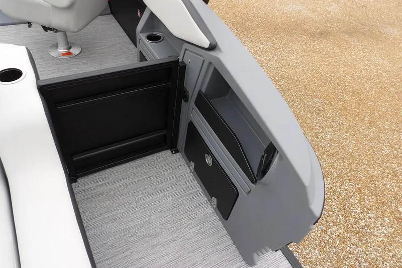 Slide: The Image of Interior view of 2026 Sylvan R-20 CLZ DH boat, featuring seating and storage compartments. - 35
