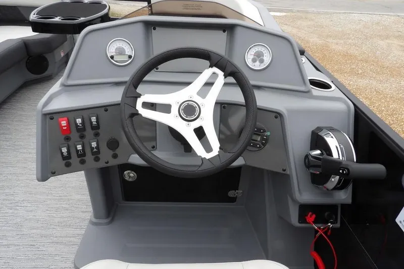 Slide: The Image of Steering console of 2026 Sylvan R-20 CLZ DH boat with modern controls and gauges. - 6