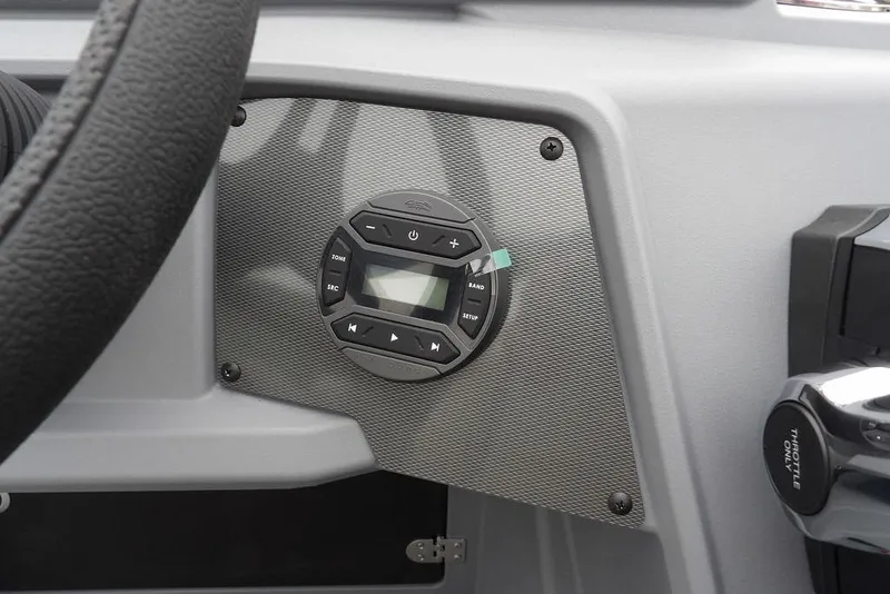Slide: The Image of Dashboard controls of 2026 Sylvan R-20 CLZ DH boat, featuring modern audio system. - 8