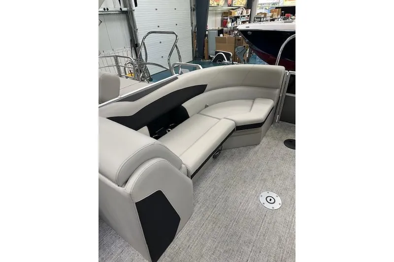 Slide: The Image of 2026 Berkshire 24RFX LE boat interior with plush seating and modern design. - 13