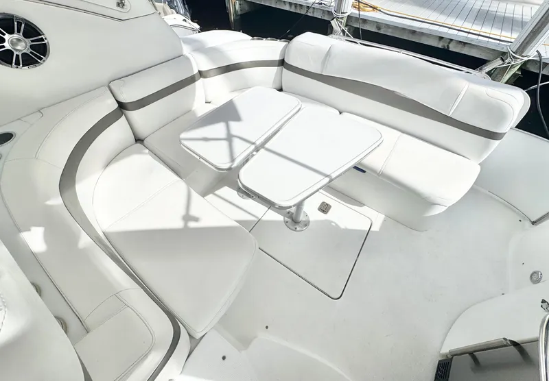 Slide: The Image of Interior of a 2004 Formula 37 Performance Cruiser with white seating. - 11