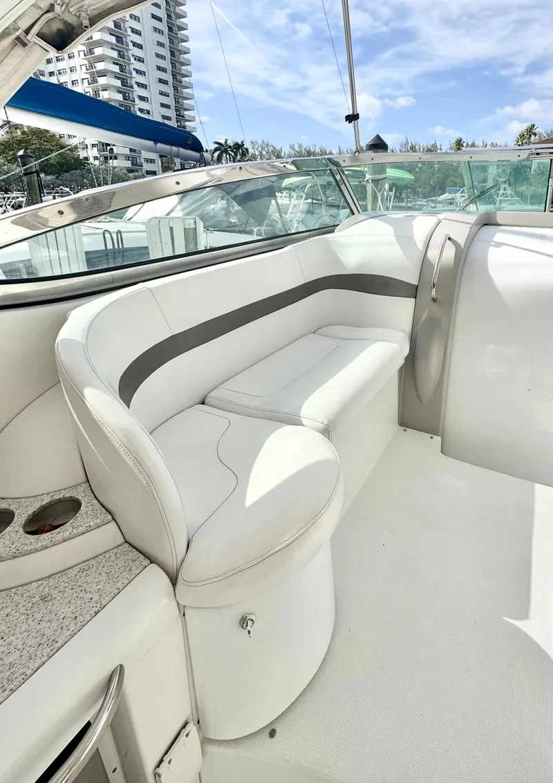 Slide: The Image of Interior of a 2004 Formula 37 Performance Cruiser with white seating. - 14