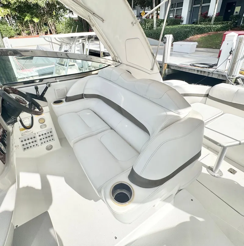 Slide: The Image of Interior of a 2004 Formula 37 Performance Cruiser with white leather seating. - 15
