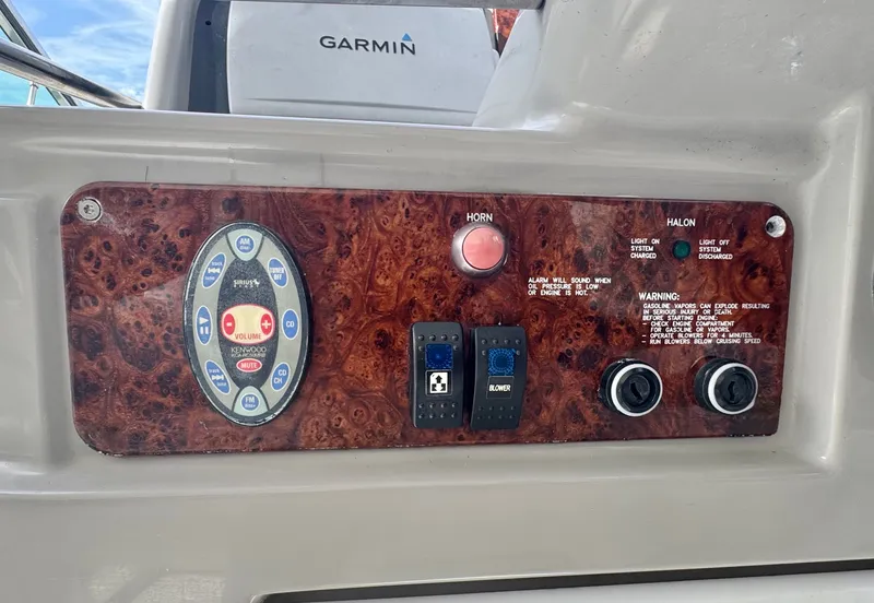 Slide: The Image of Control panel of a 2004 Formula 37 Performance Cruiser with Garmin system. - 18