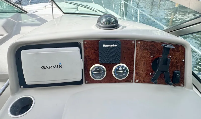 Slide: The Image of 2004 Formula 37 Performance Cruiser helm with Garmin and Raymarine equipment. - 19