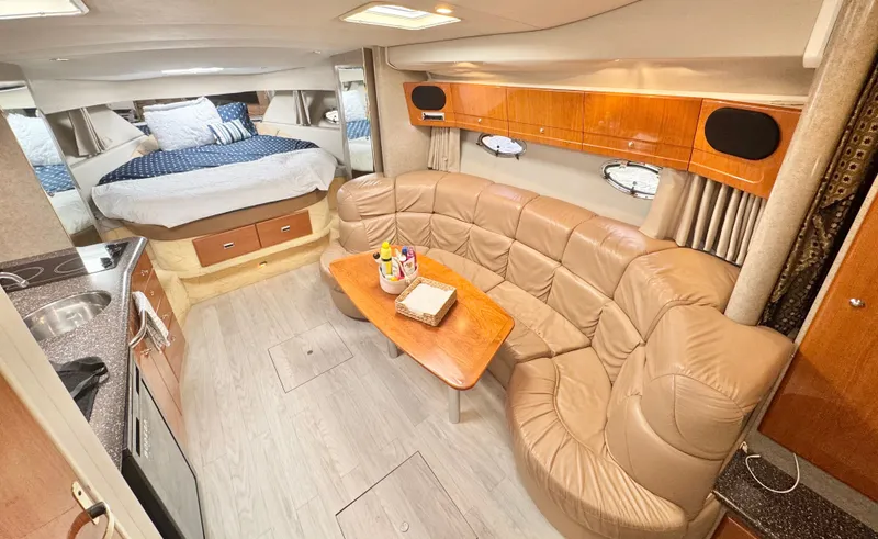 Slide: The Image of Interior of a 2004 Formula 37 Performance Cruiser with kitchen and seating area. - 20