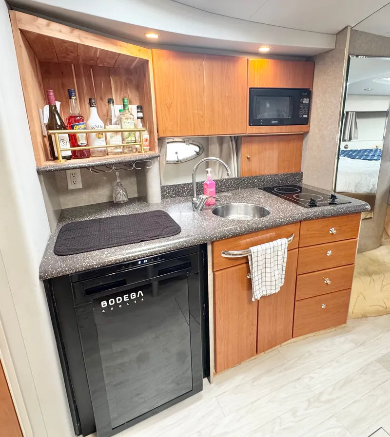 Slide: The Image of Galley kitchen in a 2004 Formula 37 Performance Cruiser yacht. - 27