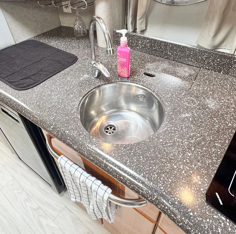 Slide: The Image of Formula 37 Performance Cruiser 2004 kitchen area with sink and countertop. - 29