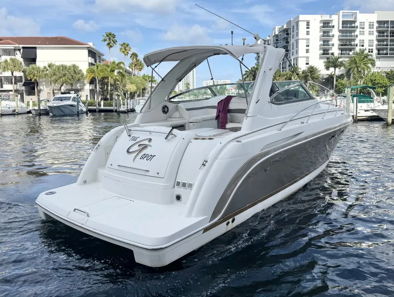 Slide: The Image of 2004 Formula 37 Performance Cruiser docked, sleek design. - 3