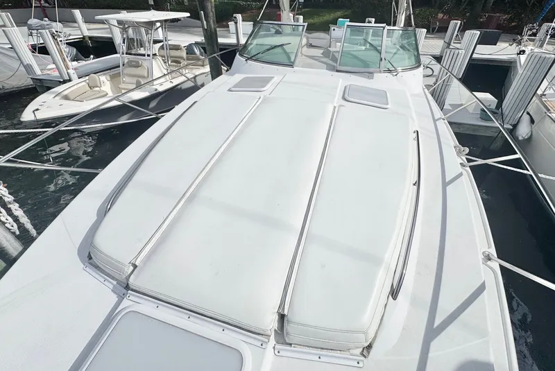 Slide: The Image of 2004 Formula 37 Performance Cruiser at dock, front deck view. - 40
