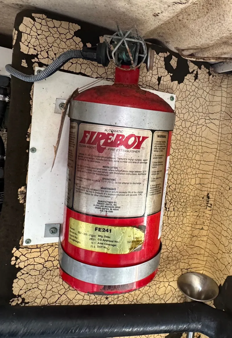 Slide: The Image of Fire extinguisher in a 2004 Formula 37 Performance Cruiser. - 45