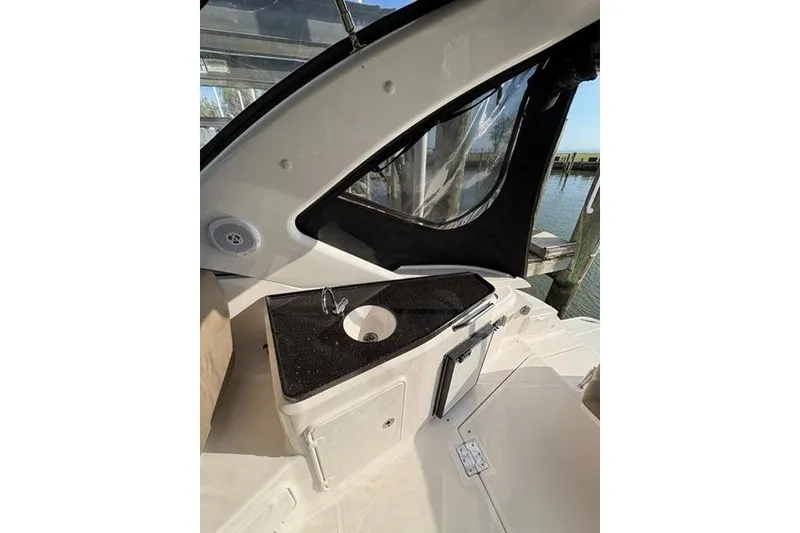 Slide: The Image of 2013 Regal 35 Express Cruiser interior with sink and countertop. - 11