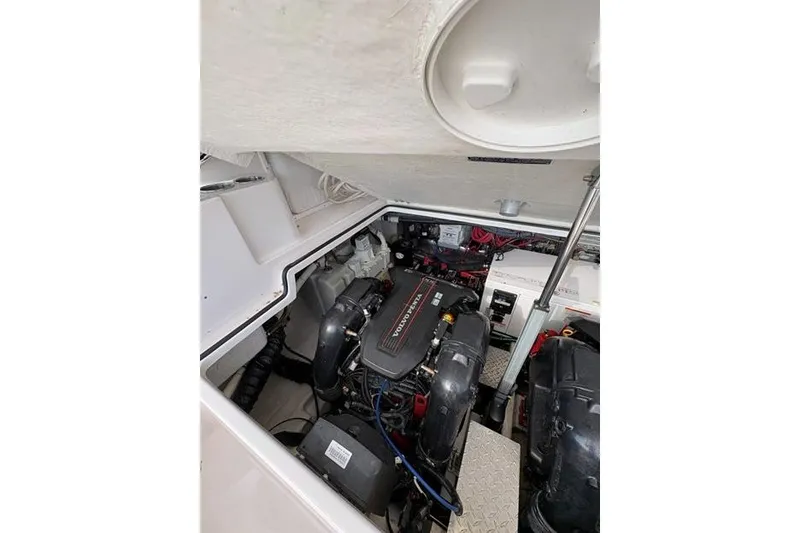 Slide: The Image of Engine compartment of a 2013 Regal 35 Express Cruiser boat. - 20