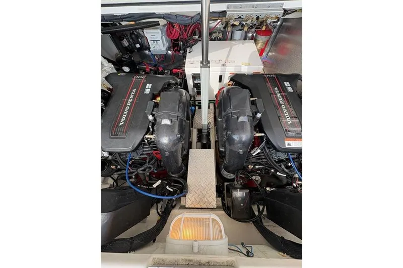 Slide: The Image of Engine compartment of a 2013 Regal 35 Express Cruiser with Volvo Penta engines. - 22