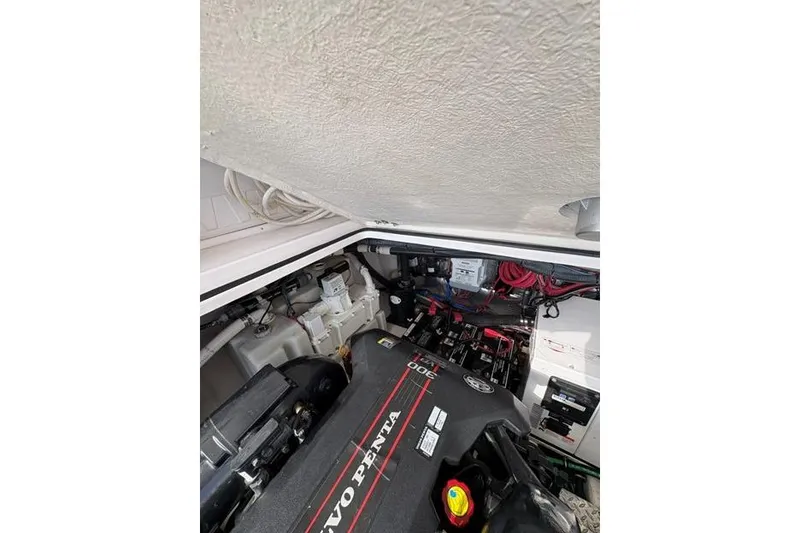 Slide: The Image of Engine compartment of a 2013 Regal 35 Express Cruiser with Volvo Penta engine. - 23