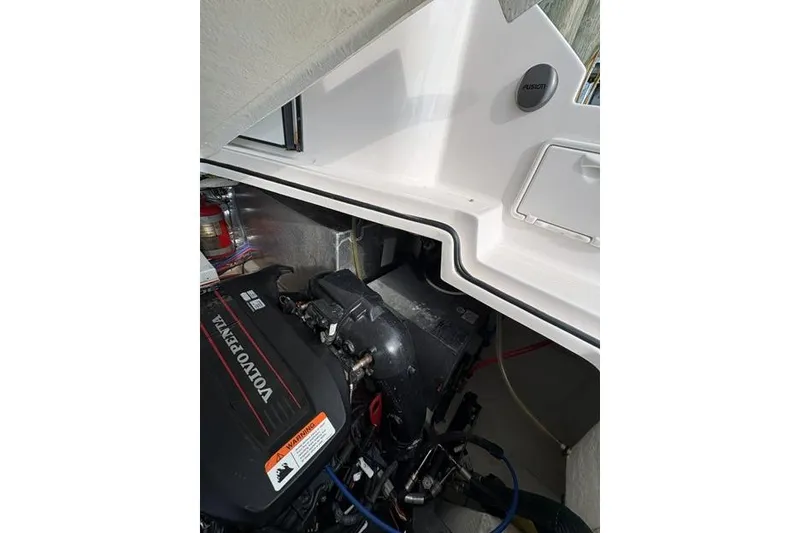 Slide: The Image of Engine compartment of a 2013 Regal 35 Express Cruiser with Volvo Penta engine. - 25