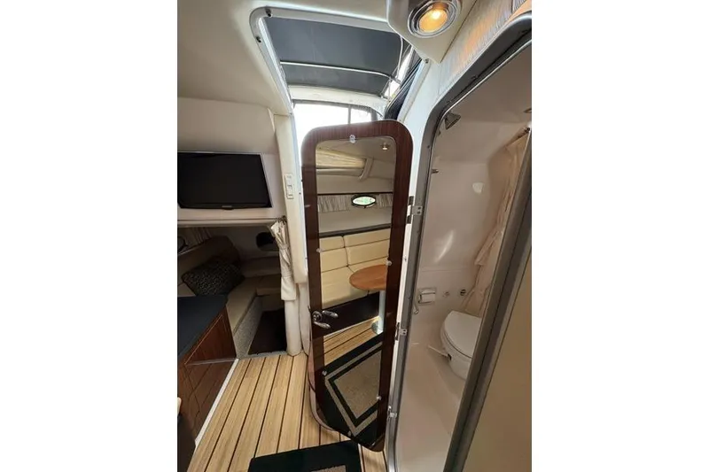 Slide: The Image of Interior of 2013 Regal 35 Express Cruiser with cozy seating and modern amenities. - 51