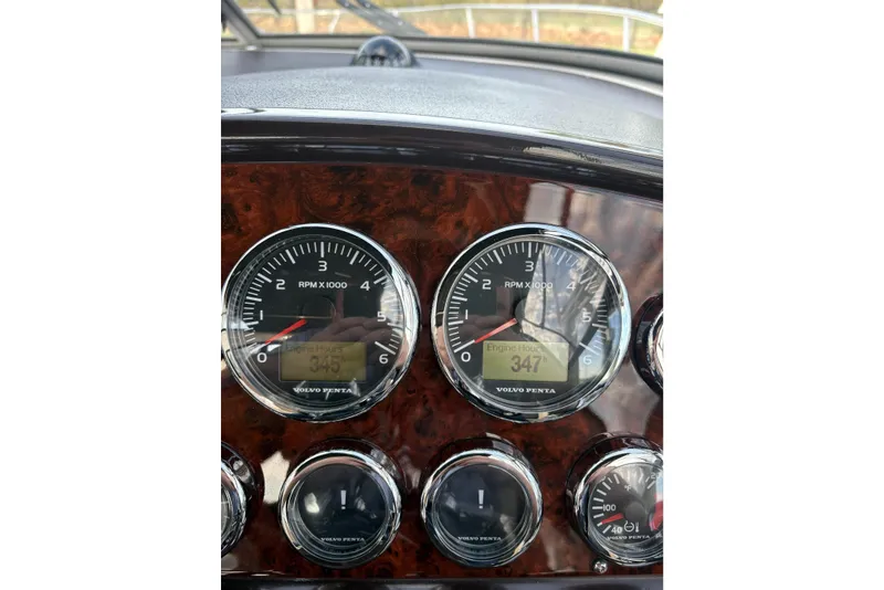 Slide: The Image of Dashboard of 2013 Regal 35 Express Cruiser showing RPM and engine hours. - 55