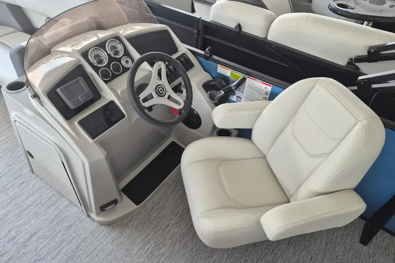 Slide: The Image of 2026 Sylvan Mirage Fish 820 Party Fish boat helm with modern controls and comfortable seating. - 5